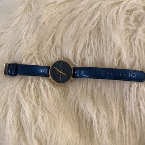 Blue leather and gold Nixon watch
